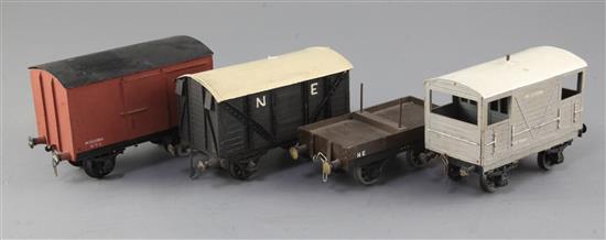 An NE flat wagon, no.2100, an NE box van, a box van 12T, no.M232582 and a guards van, 15 T, no.M353191,